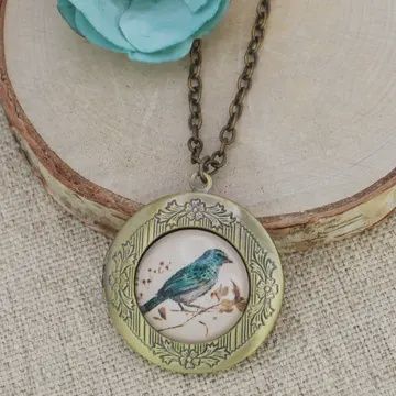VINTAGE BIRD LOCKET