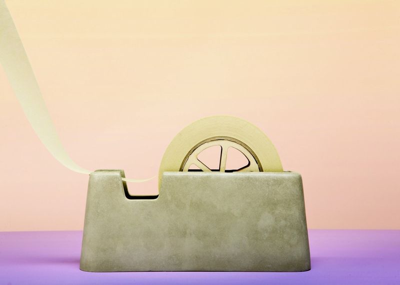CONCRETE TAPE DISPENSER