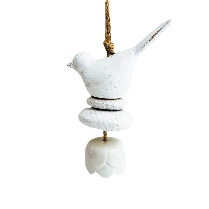 White ceramic bird bell