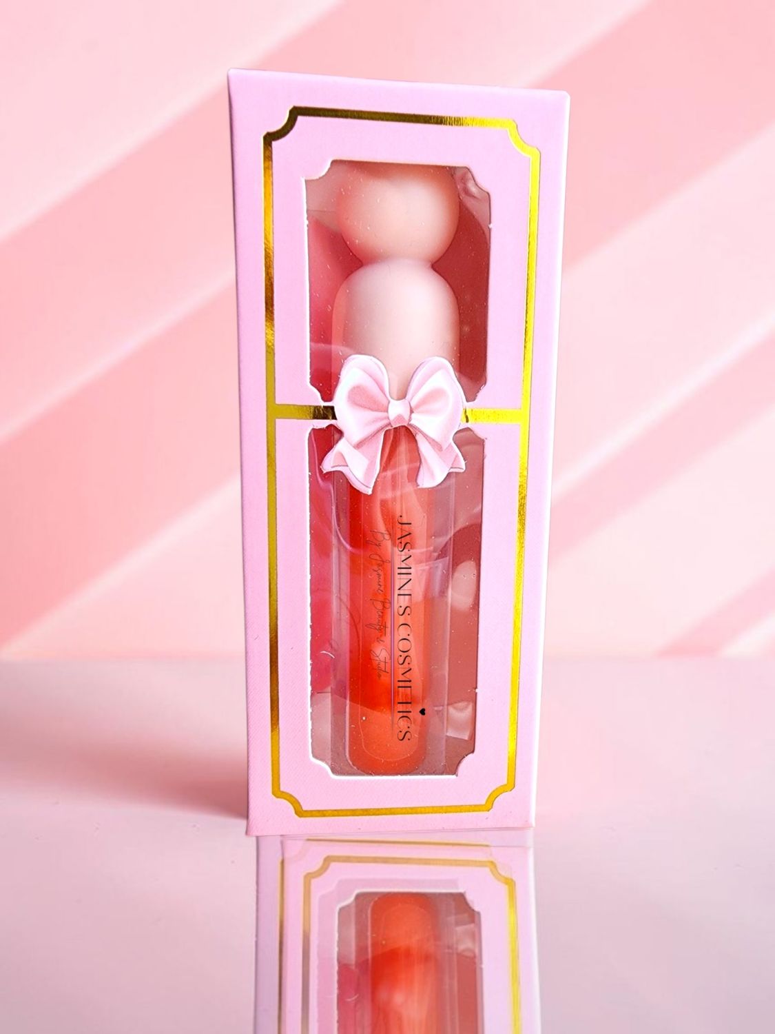 Stay Glassy with Coral Liquid Lipgloss