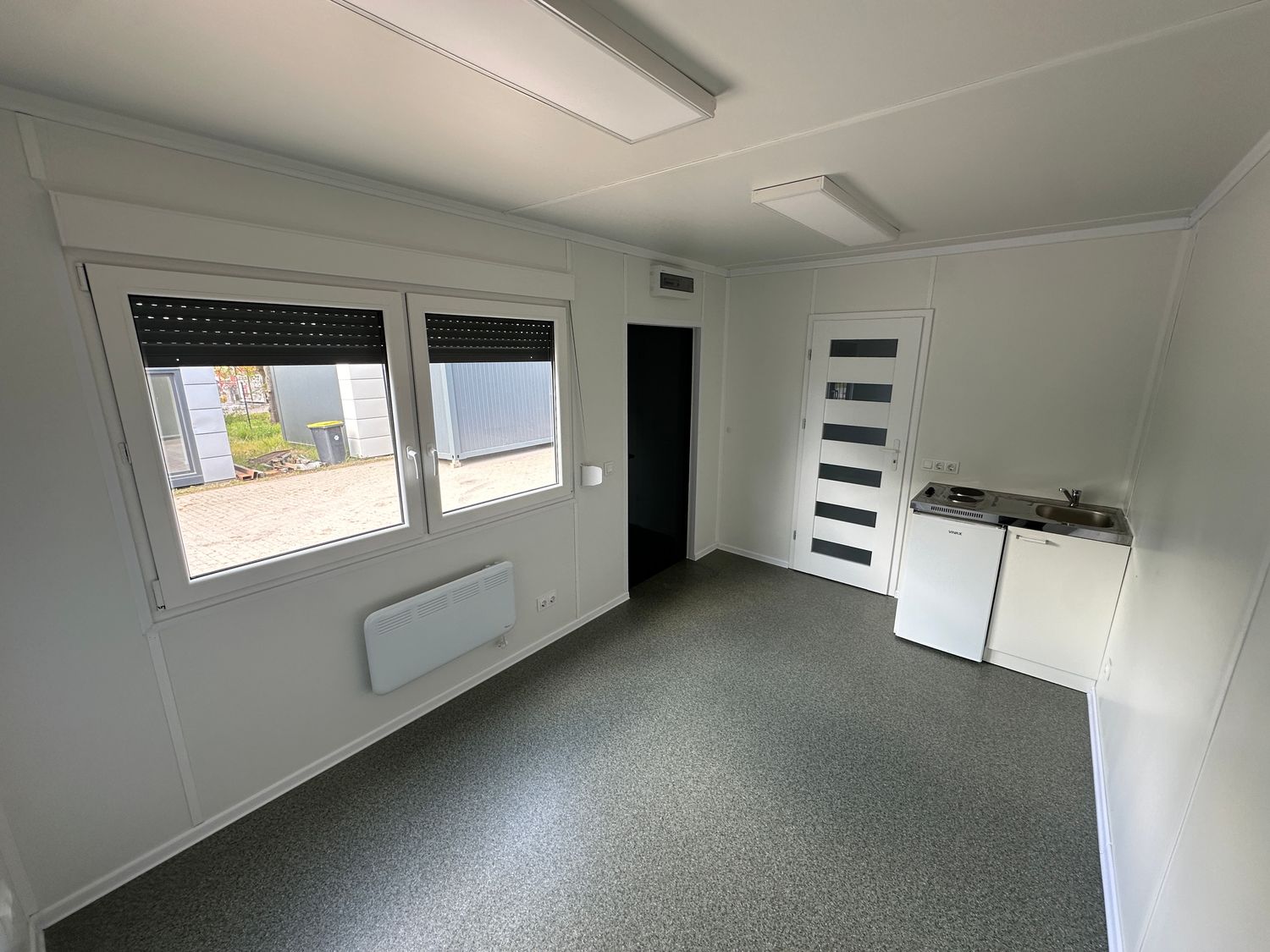 Wohncontainer 6,00 x 3,00 m mit Küchenzeile, Toilette und Dusche – Die Container