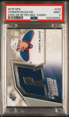 2015 SPX Connor McDavid Retro Rookie Fabrics 05-06 PSA 9