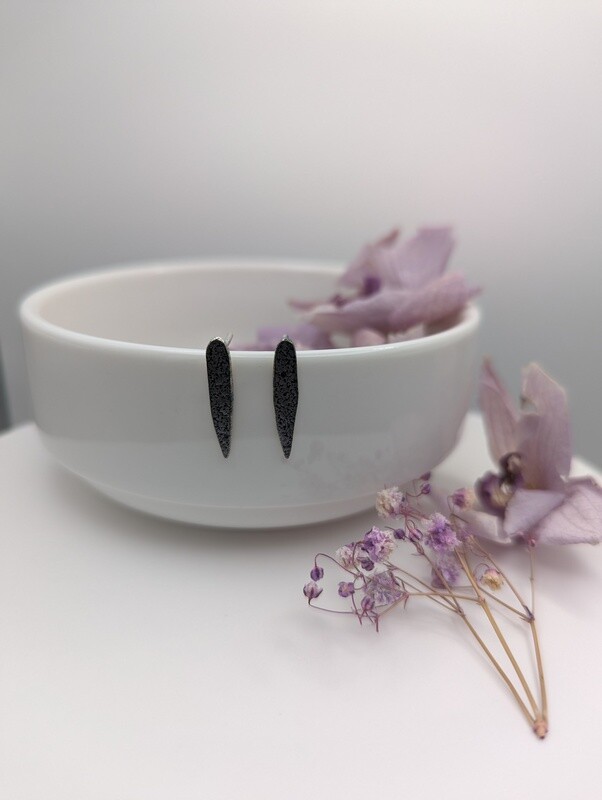 Noir, pendientes