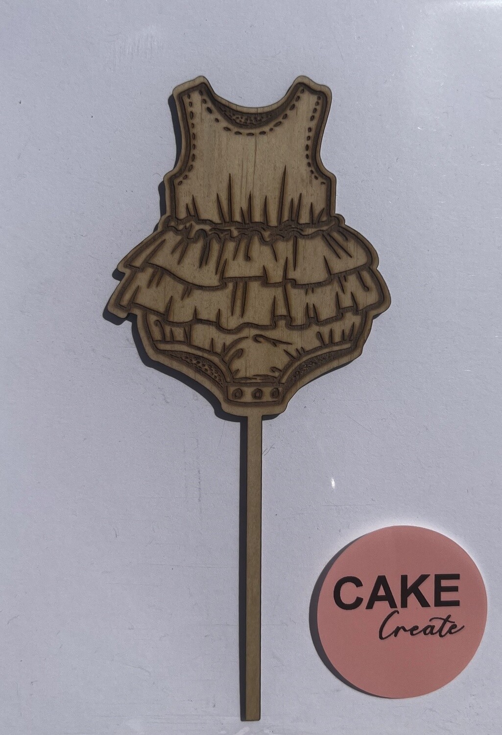 Baby girl romper cake topper