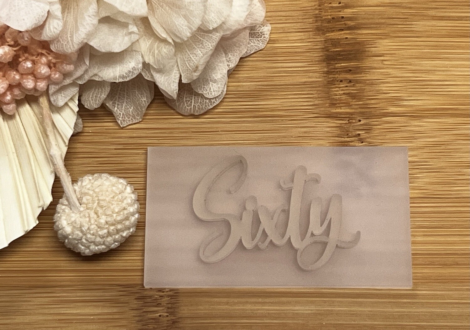 Sixty embosser stamp