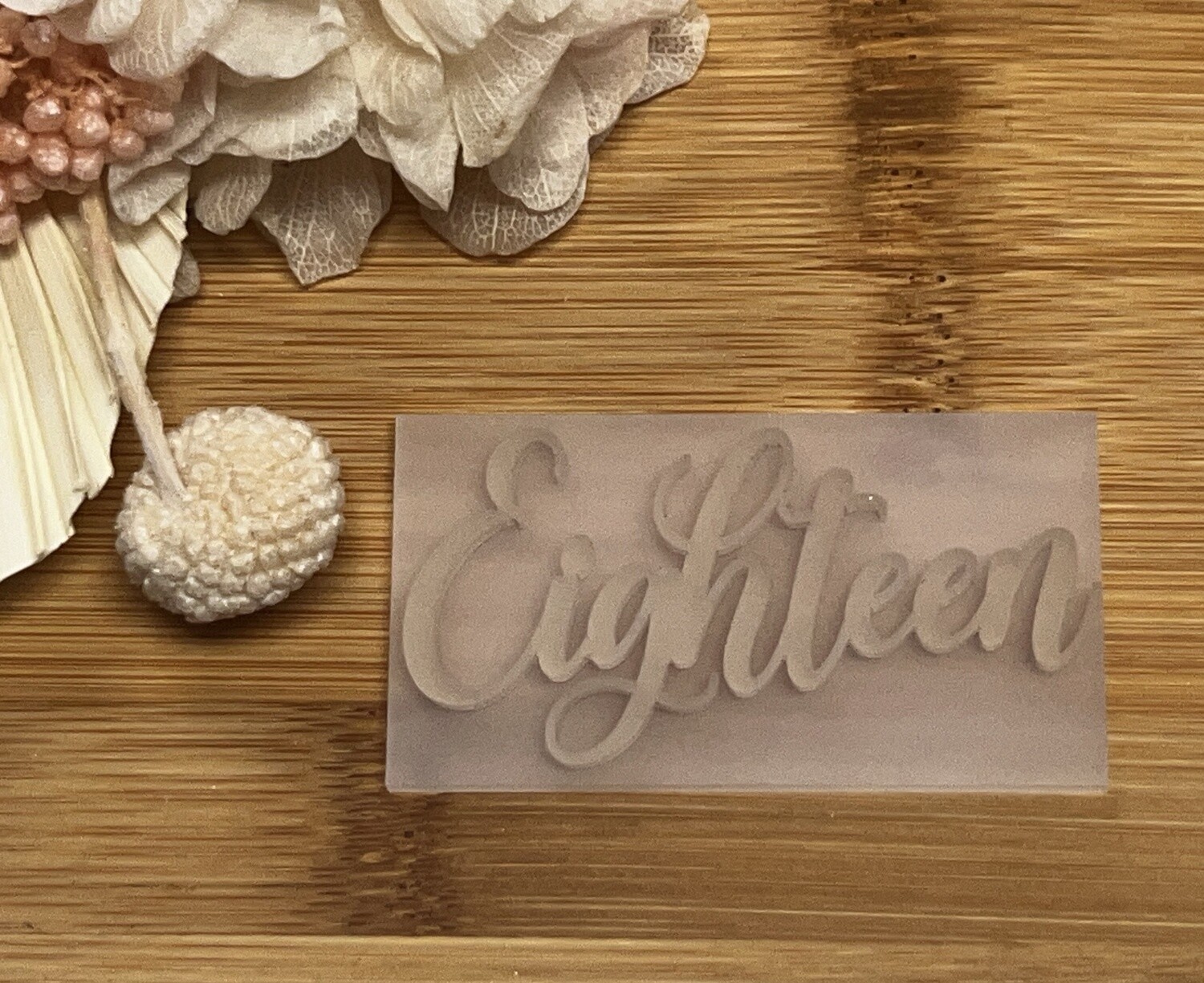 Eighteen embosser stamp