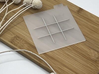 Noughts and crosses debosser stamp