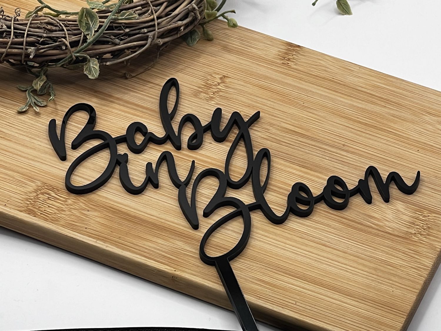 Baby in bloom cake topper