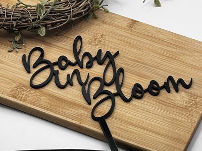 Baby in bloom cake topper