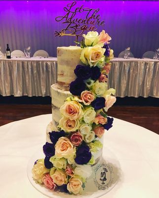 Let the adventure begin wedding cake