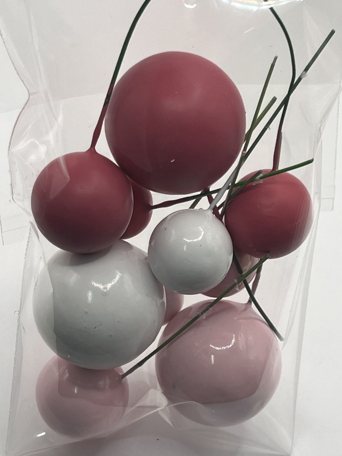 Pink and white balls