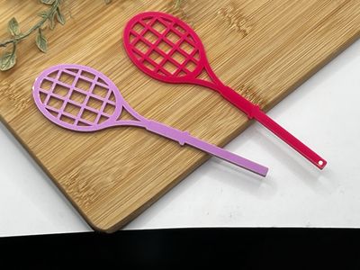 Racket cake froppers x 2