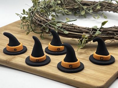 Which hat cupcake toppers