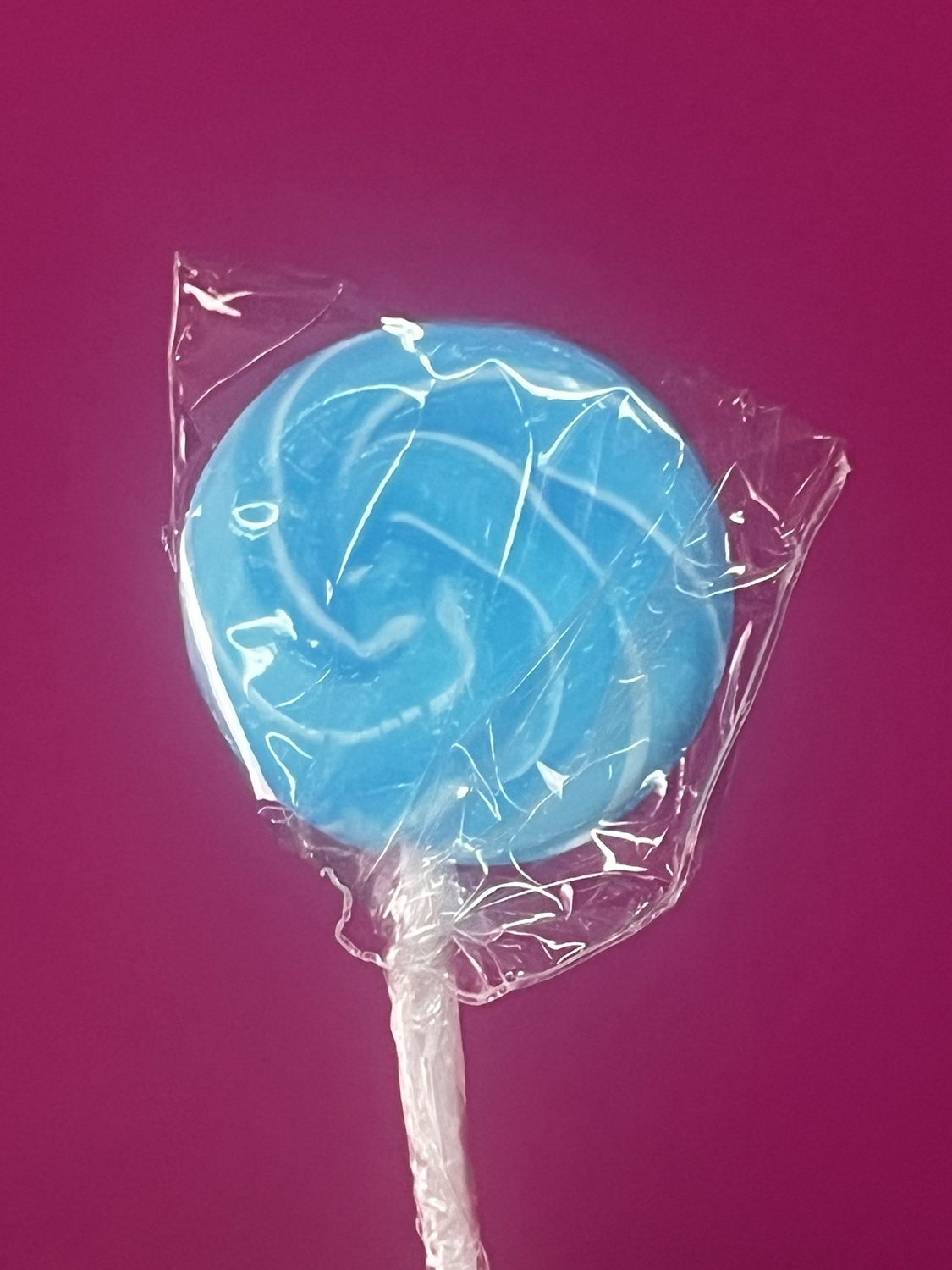 Blue and white swirl lollipop