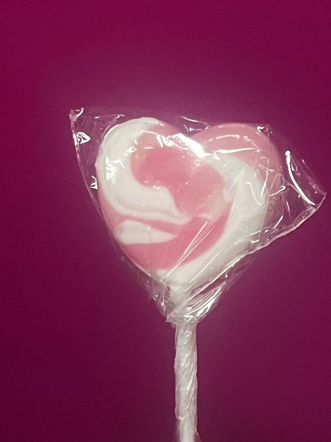 Heart pink and white swirl lollipop