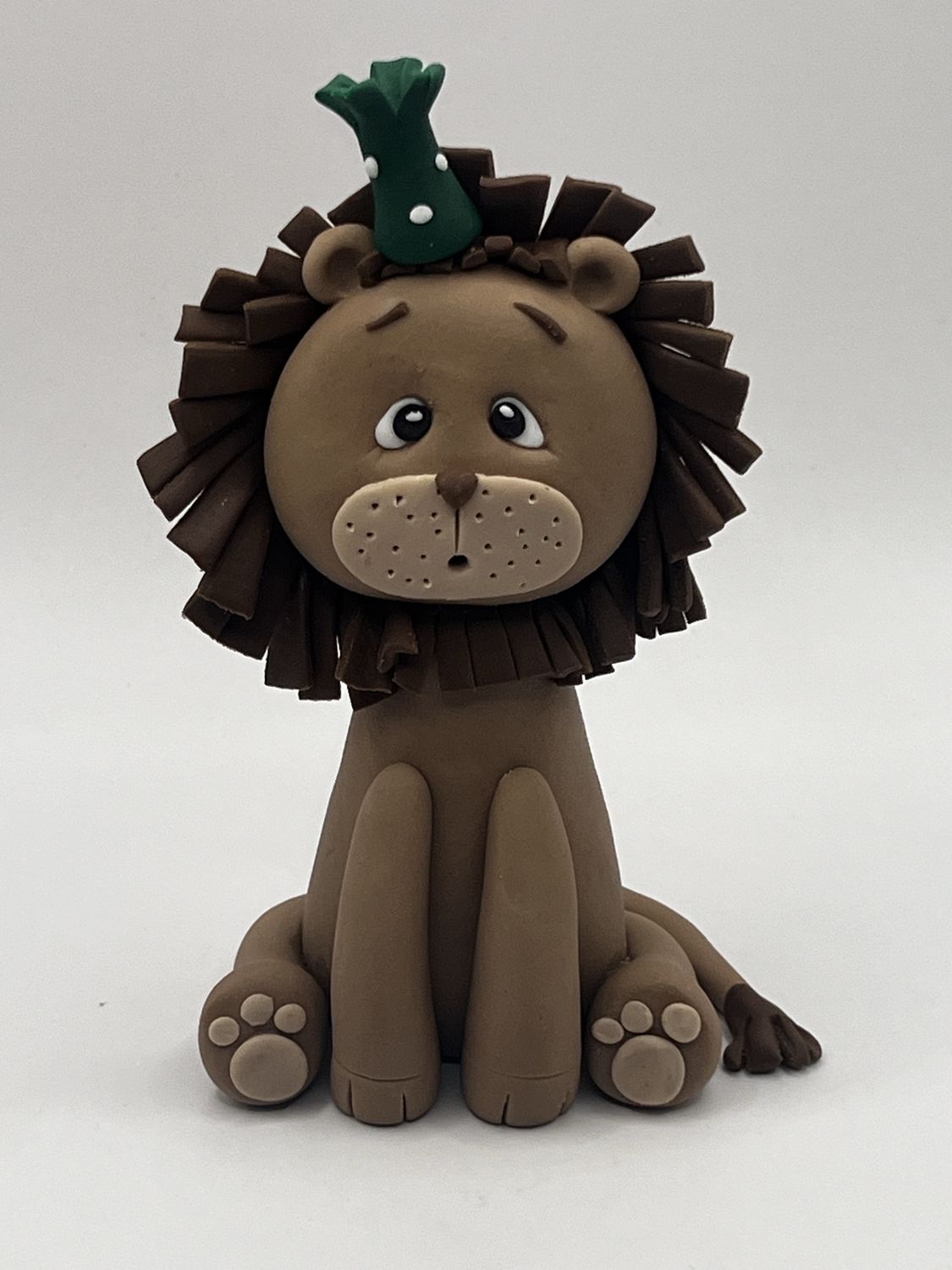 Lion with party hat cake topper