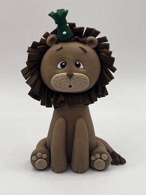 Lion with party hat cake topper