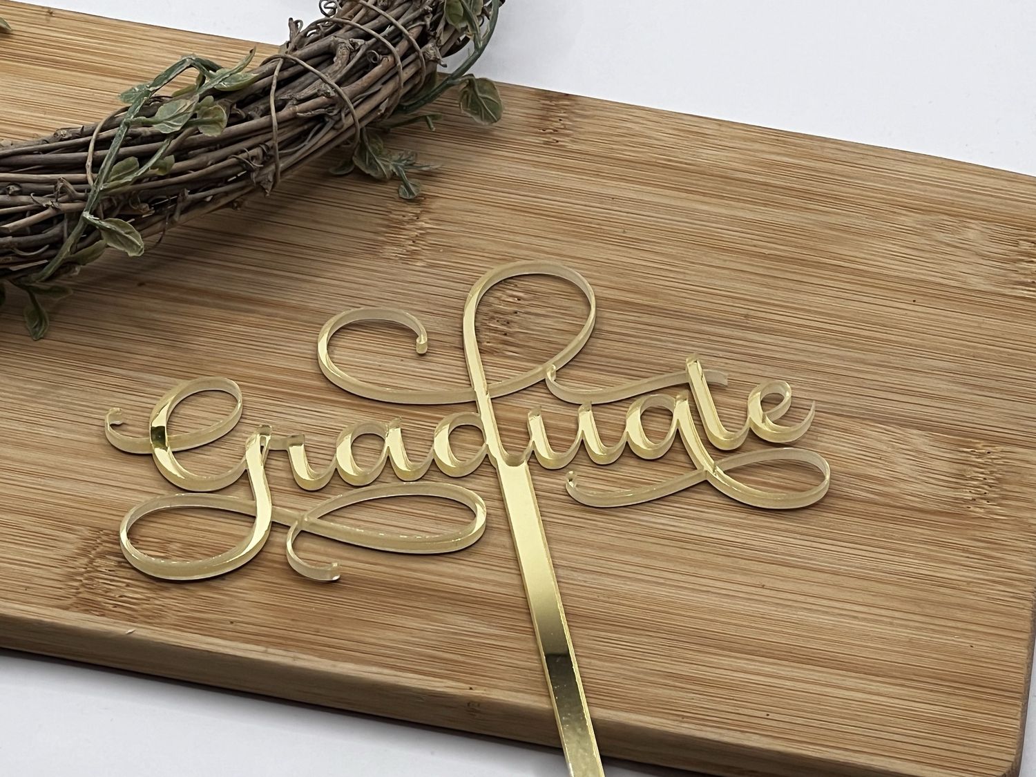 Graduate cake topper