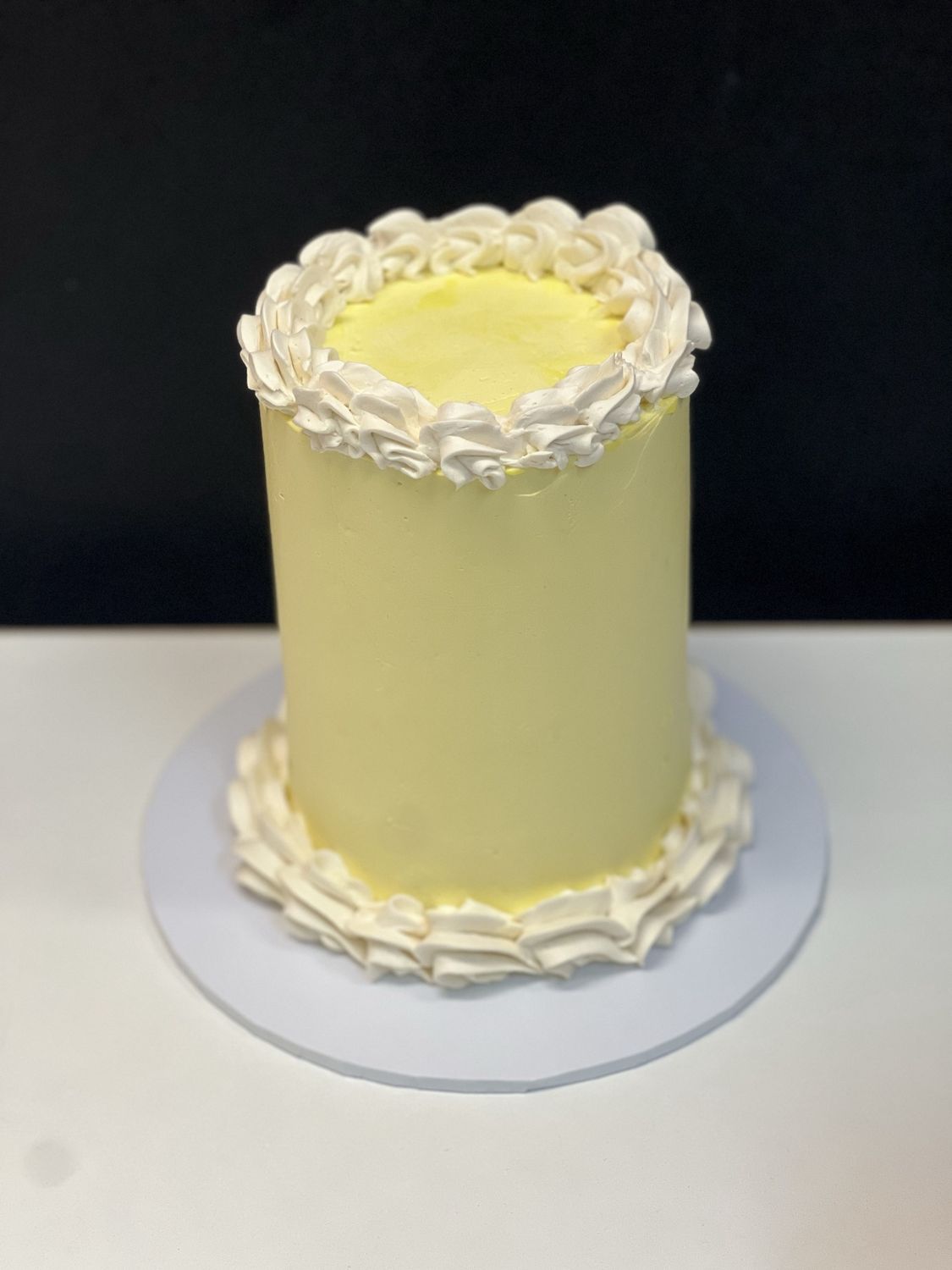 Small pastel yellow cake