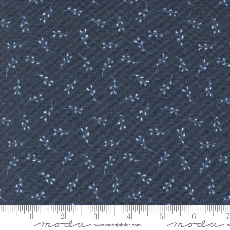 flower buds on dark blue fabric