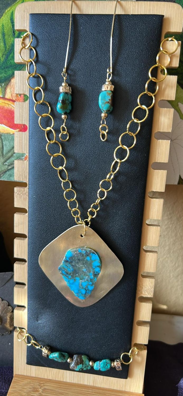 Spider Web Turquoise pendent on brass plate with handmade gold color metal chain. TQ earrings on gold color surgical steel wire. TQ bracelet on handmade metal chain large easy clasp. $169
