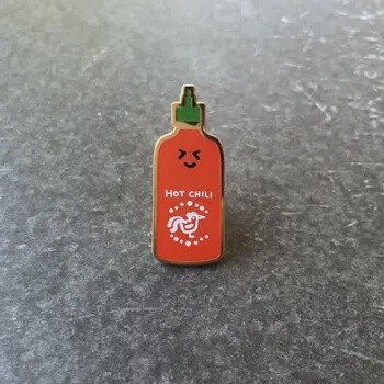 Silly sriracha enamel pin