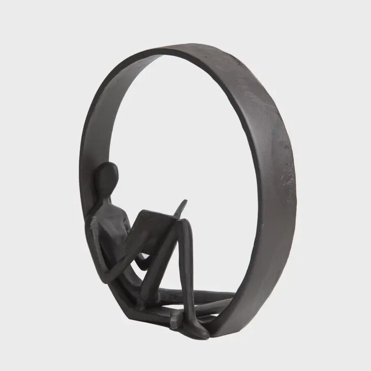 Contemporary Encircled Reader Cast Iron Sculpture