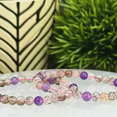 6mm Super 7 Melody Rutilated Beaded Bracelet 7.5in