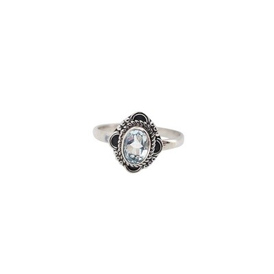 Blue Topaz Faceted Oval in Diamond Sterling Silver Ring