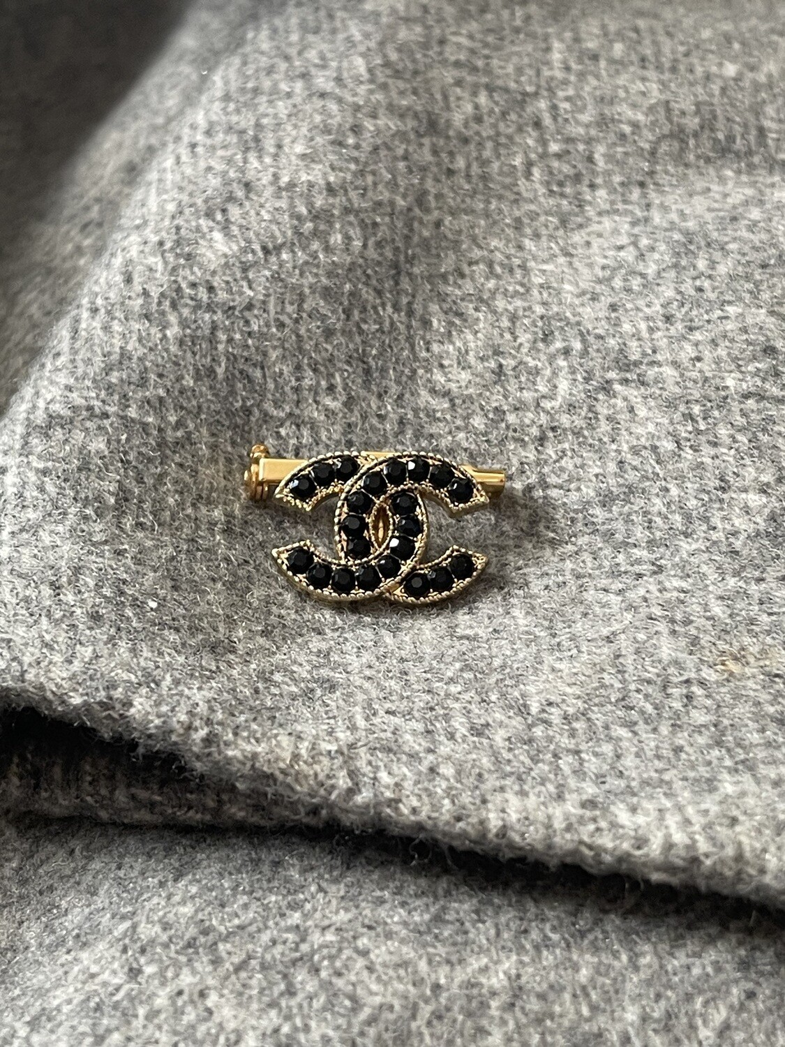 Black rhinestones logo reworked brooch
