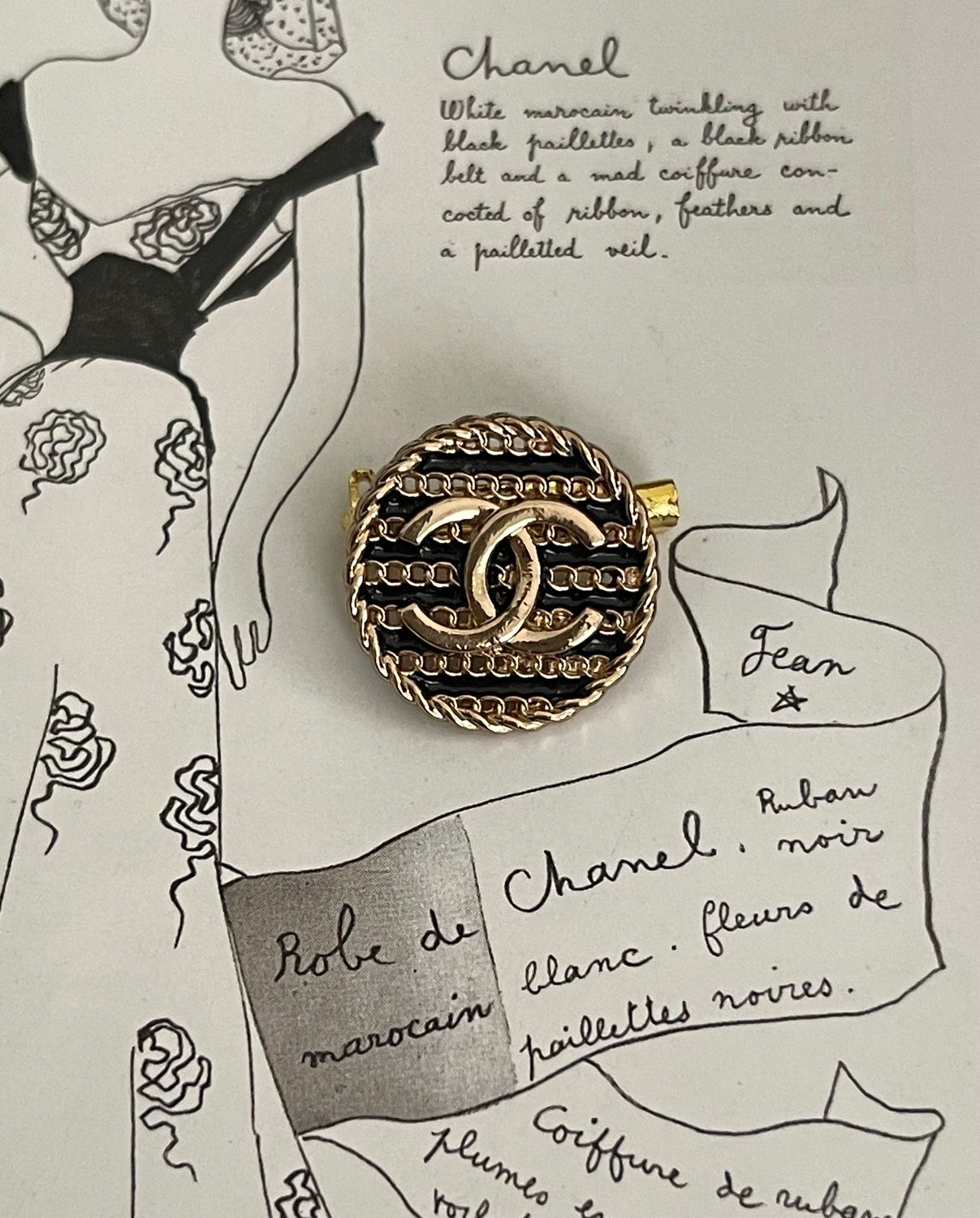 Gold tone and black chain small brooch