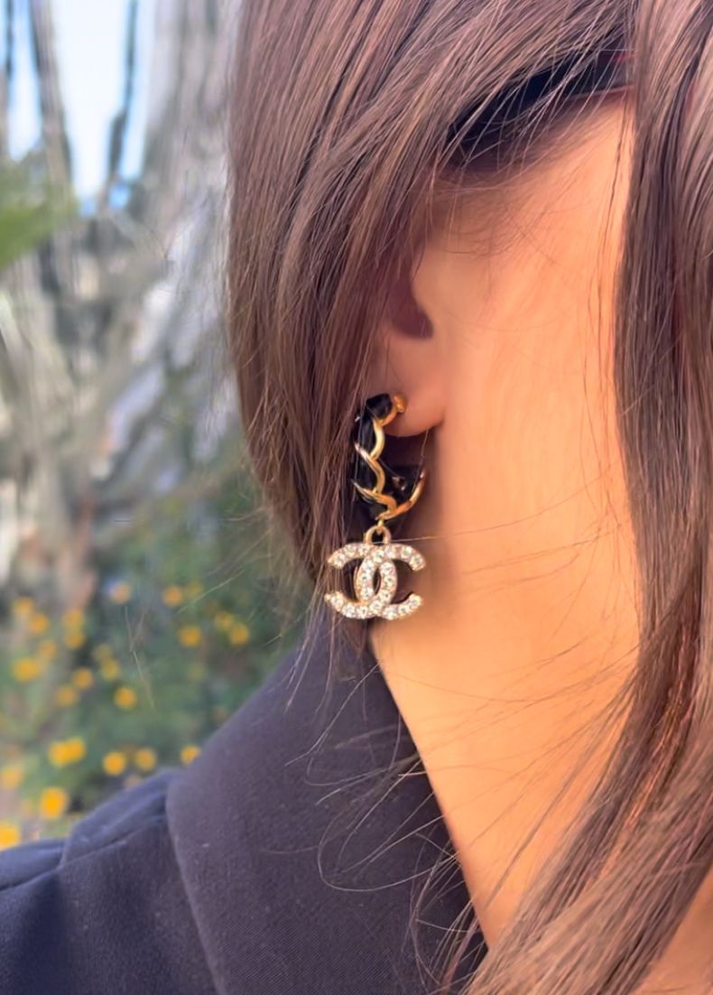 Delicate repurposed earrings with charm