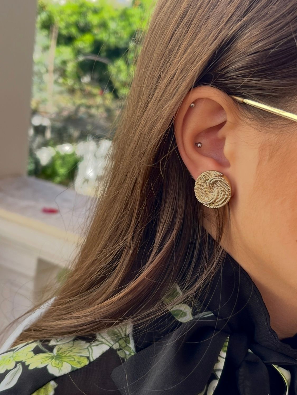 Delicate gold tone earrings