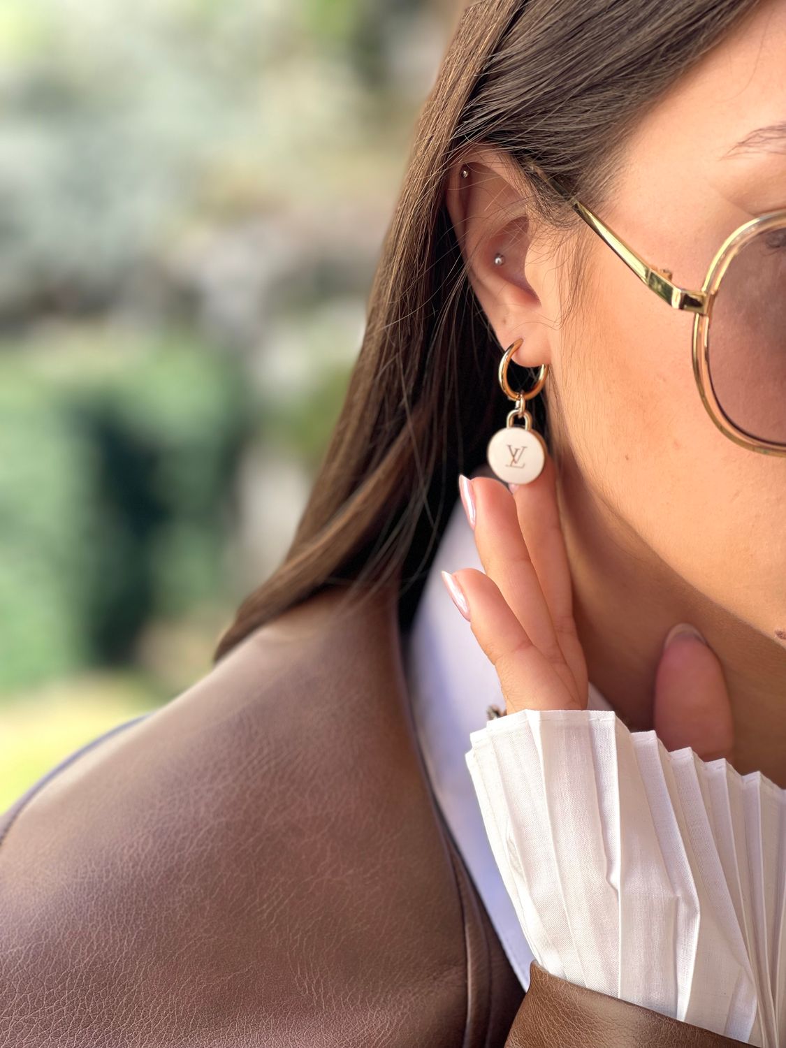 Stylish hoop earrings with small charm
