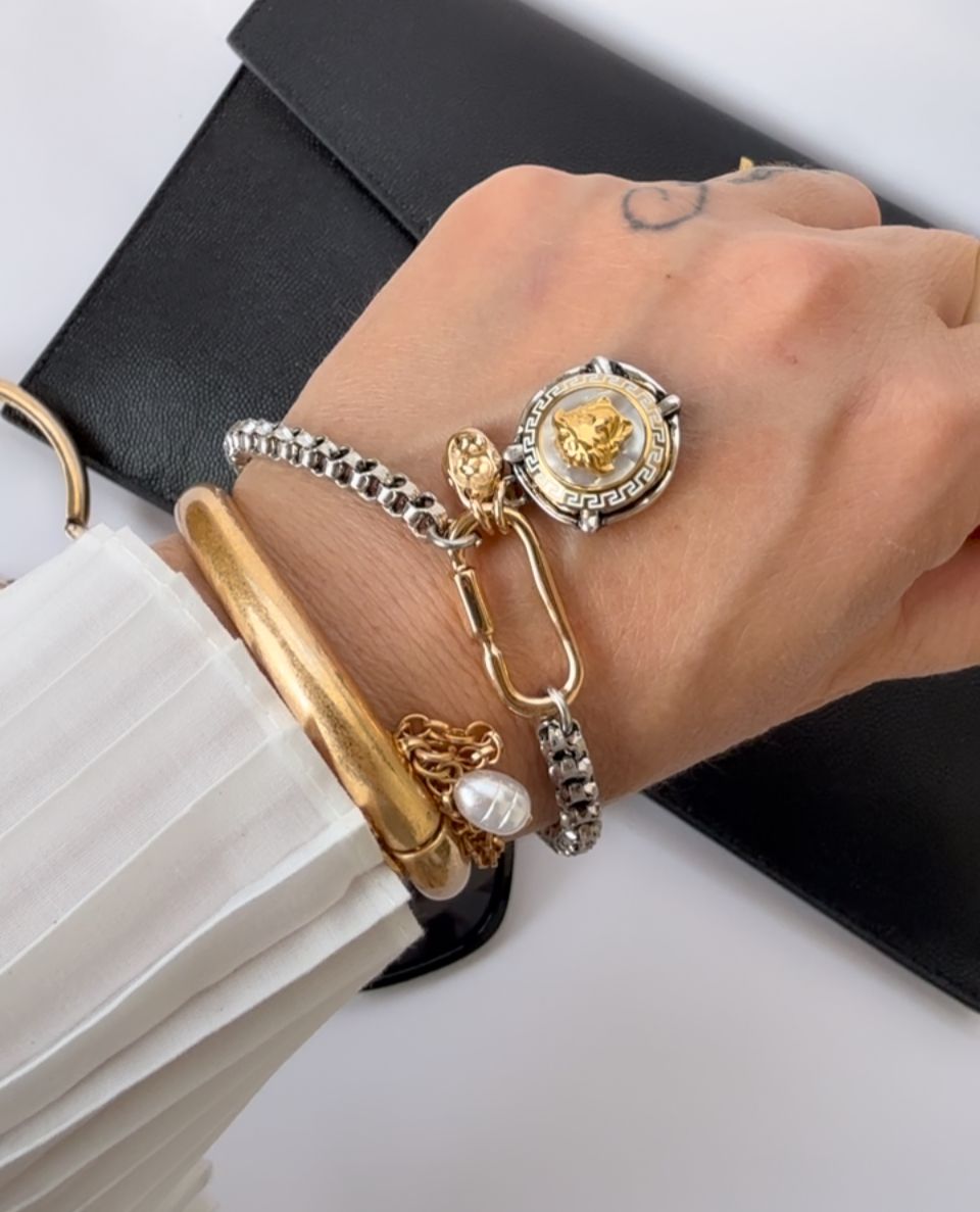 Stylish silver and gold tone Medusa bracelet