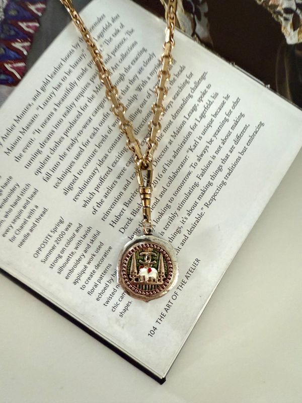 Unique charm gold tone long necklace