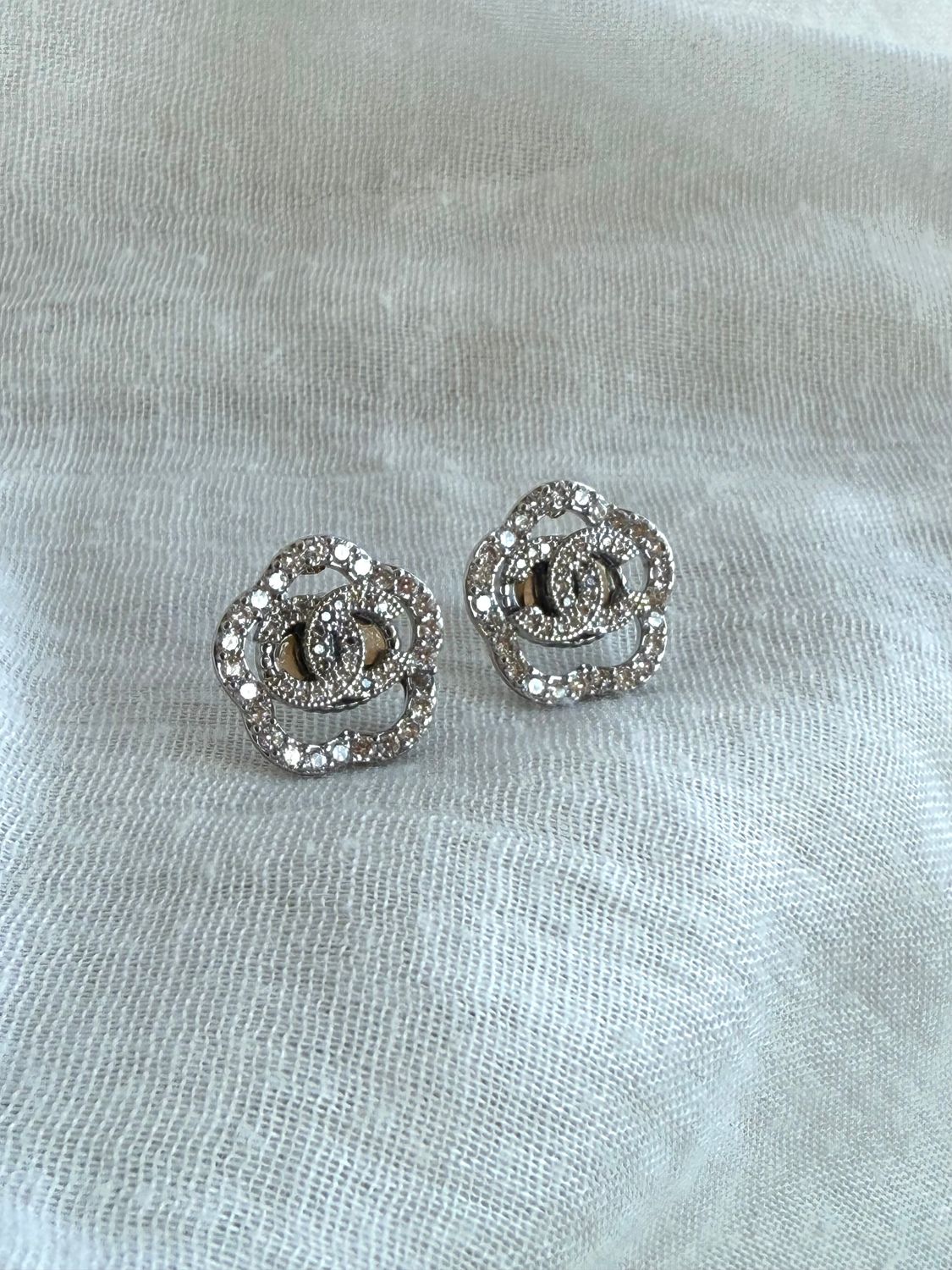 Elegant silver tone earrings with tiny rhinestones