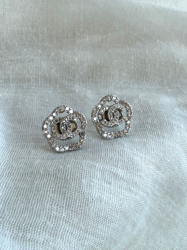 Elegant silver tone earrings with tiny rhinestones