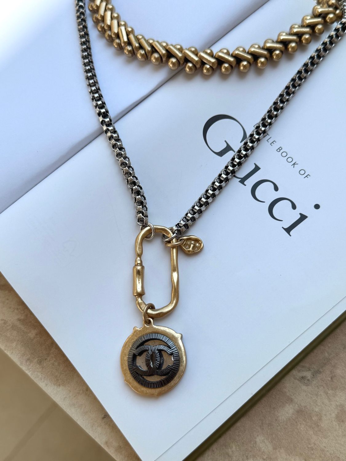 Stylish necklace with black charm button