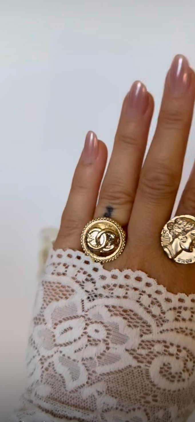 Elegant gold tone button ring