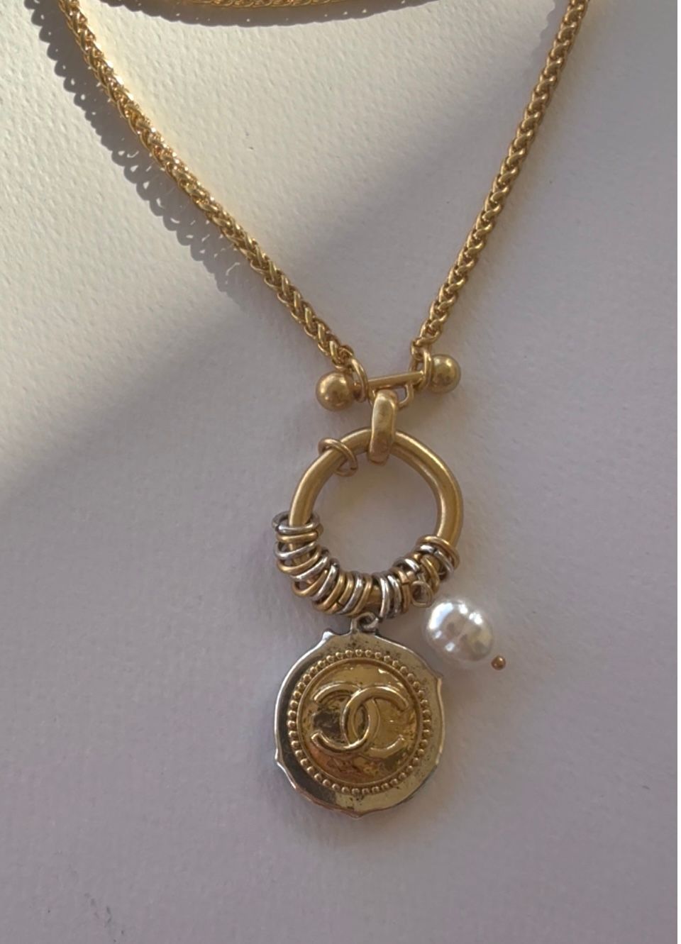 Elegance long chain gold tone button necklace