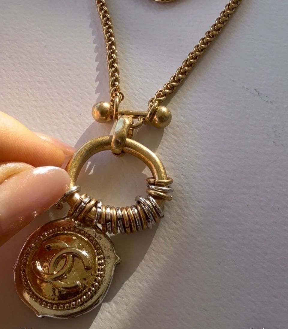 Elegance long chain gold tone button necklace