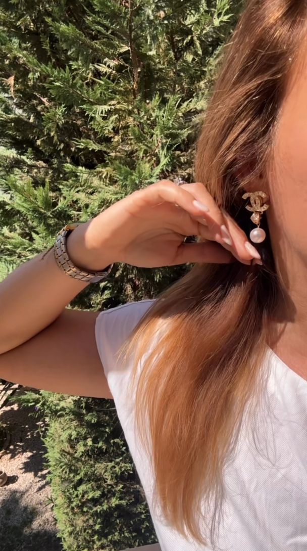Elegant gold tone pearl drop earring