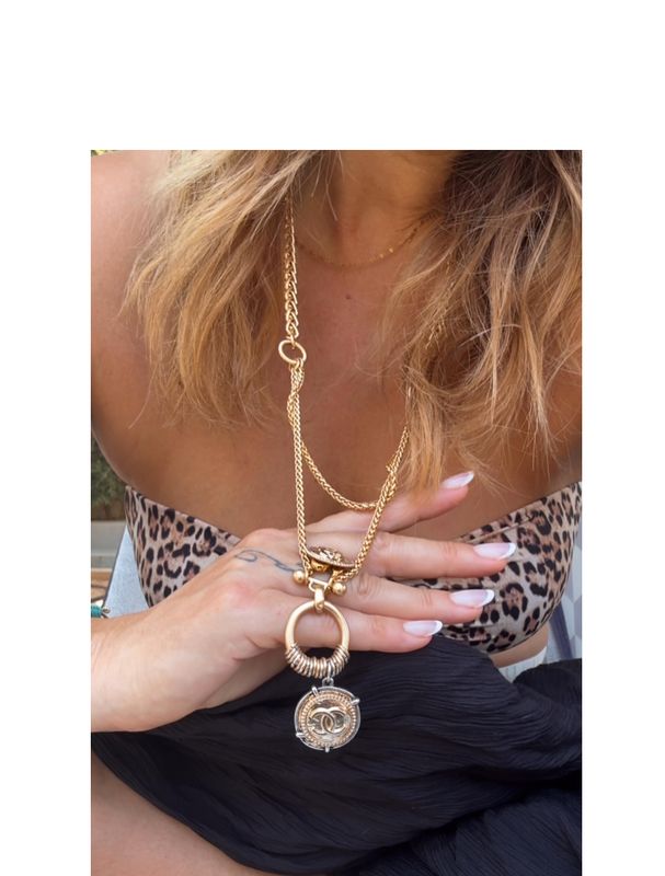 Elegance long chain gold tone button necklace