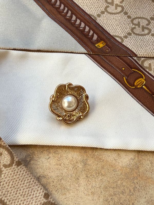 Gold tone pearl reworked brooch