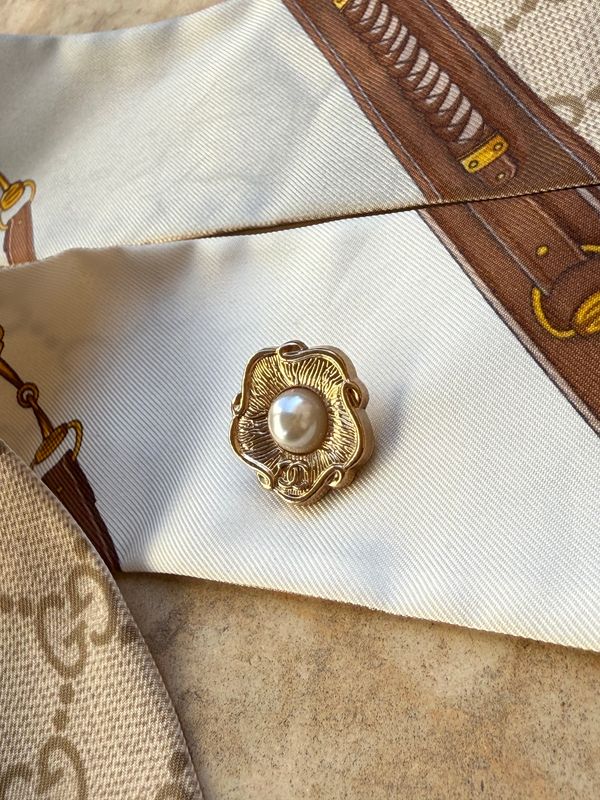 Gold tone pearl reworked brooch