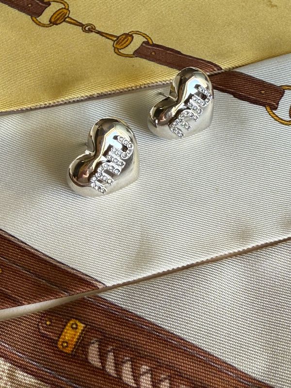 Elegant heart silver tone earrings
