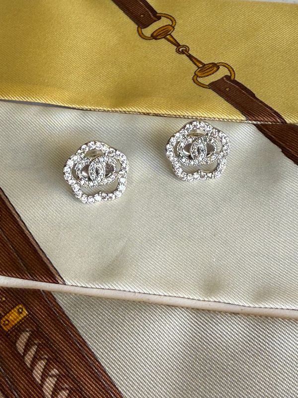 Elegant silver tone earrings with tiny rhinestones