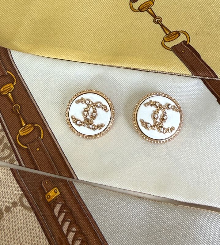 Elegant white reworked gold tone earrings