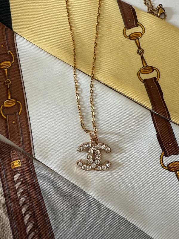 Delicate charm necklace gold tone with tiny rhinestones